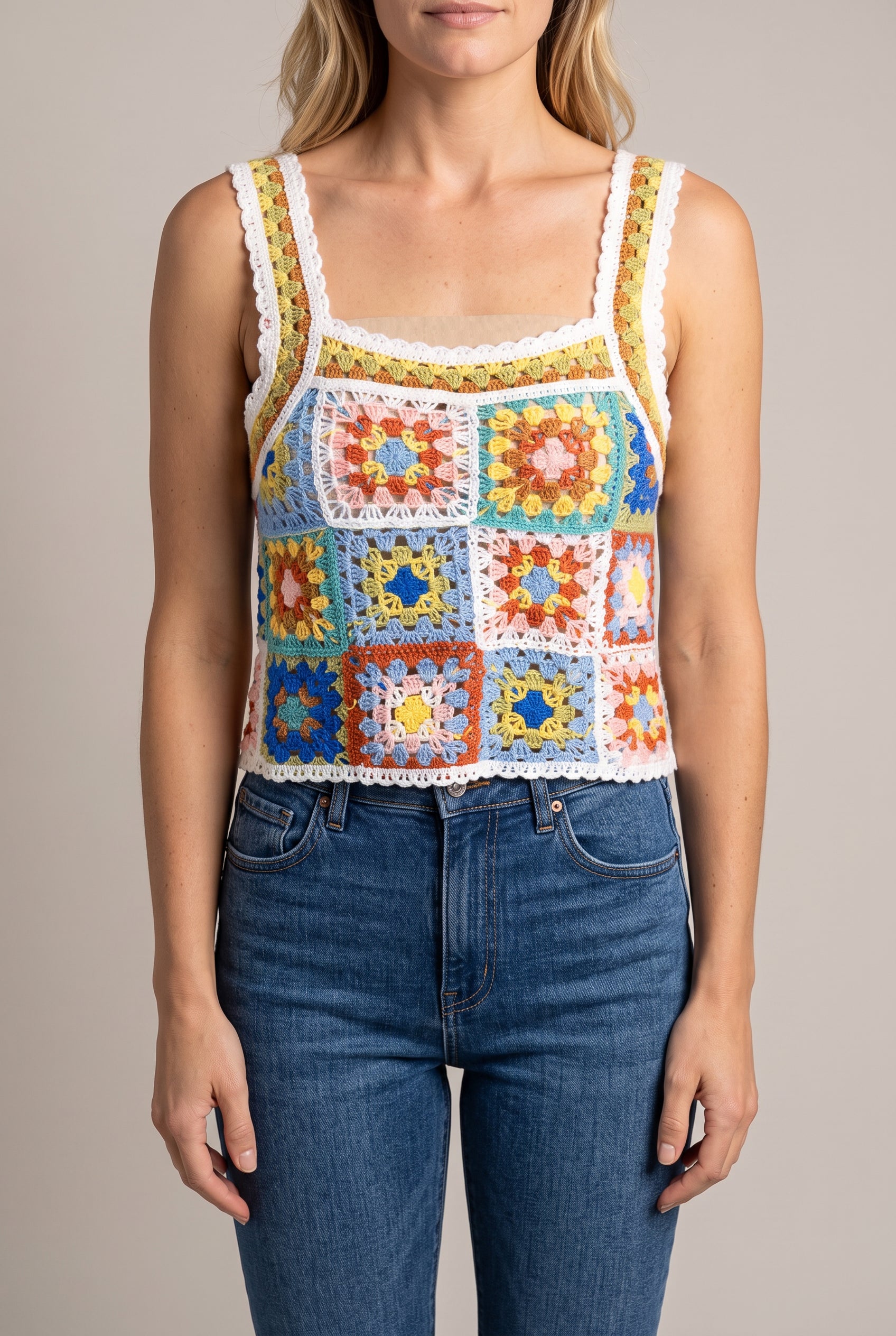 Front view of the In The City Crochet Tank Top showing its square neck, crop length and openwork.
