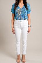 Front view of All of Me white cropped jeans showing the mid-rise waist, pockets and slim-straight fit.