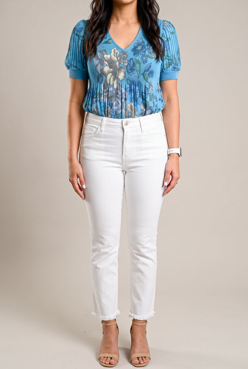 Front view of All of Me white cropped jeans showing the mid-rise waist, pockets and slim-straight fit.