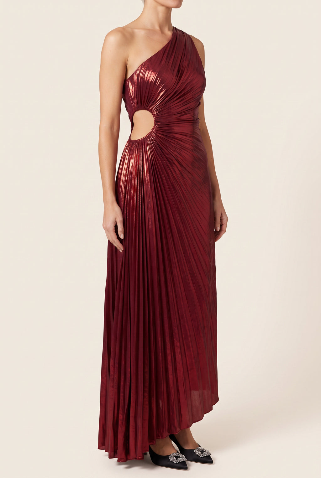 Angled side fit of the Give Me Everything Tonight Wine Maxi Dress showing the waist cutout and drape.