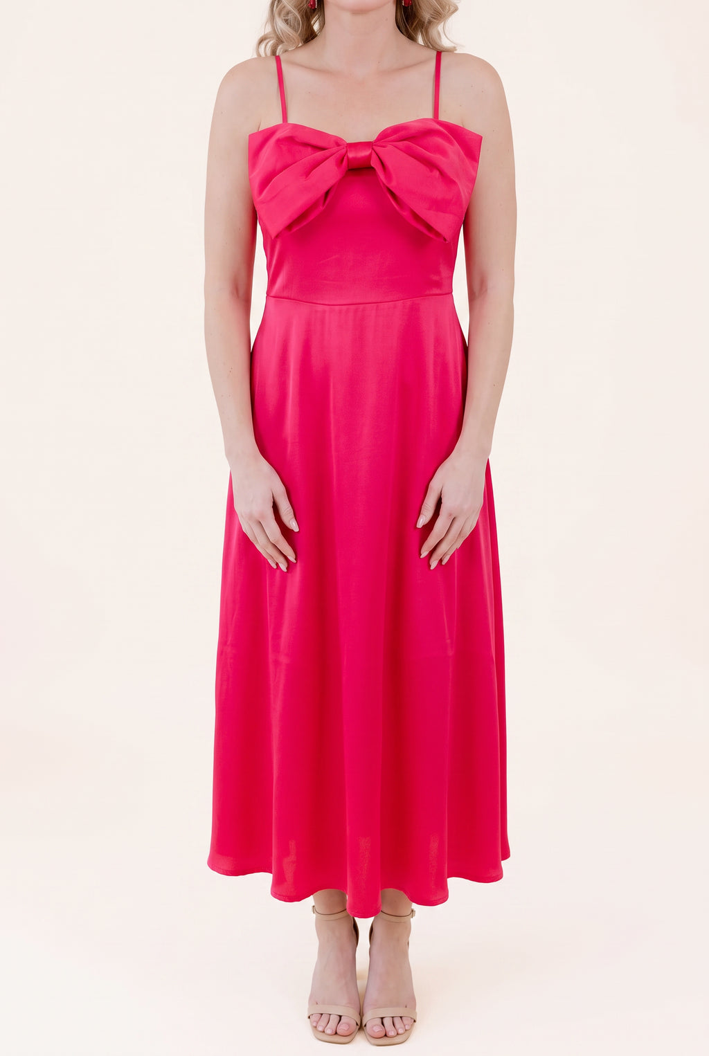 Front view of the Fuchsia Bow-tiful You Midi Dress showing the bow and full A-line length.