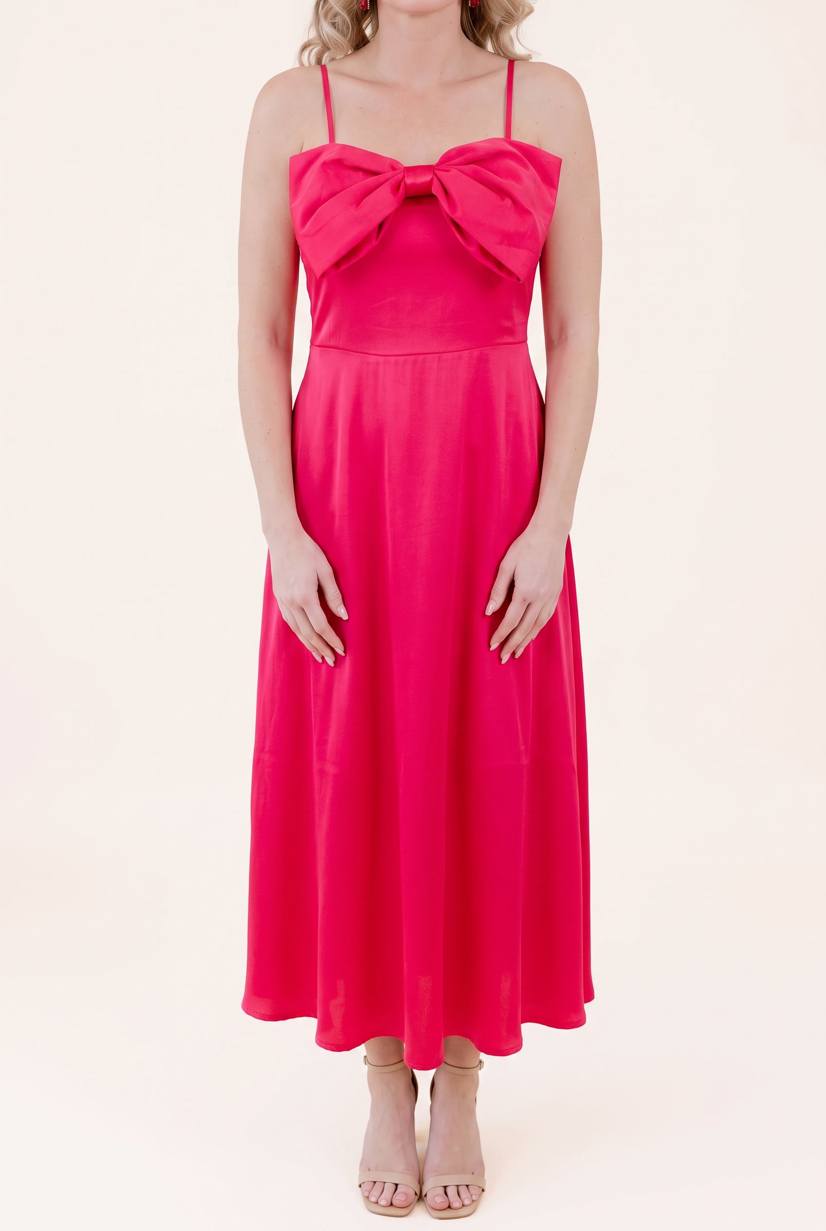 Front view of the Fuchsia Bow-tiful You Midi Dress showing the bow and full A-line length.