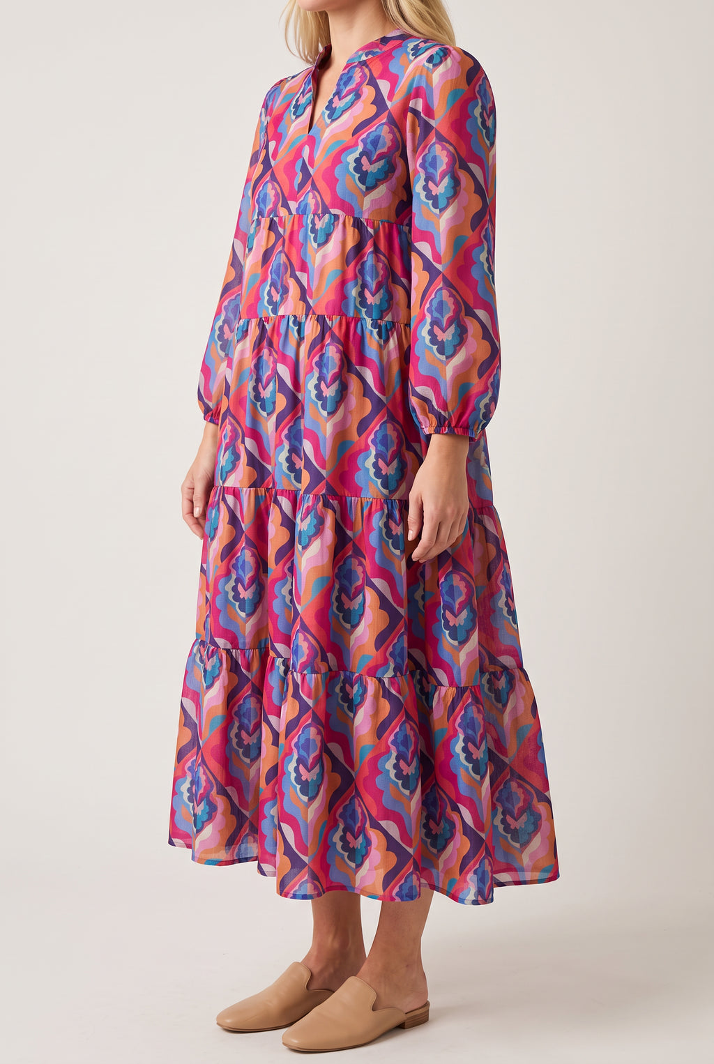 Angled side fit of the Calling You maxi dress showing its high seam, relaxed ease and tiered fall.