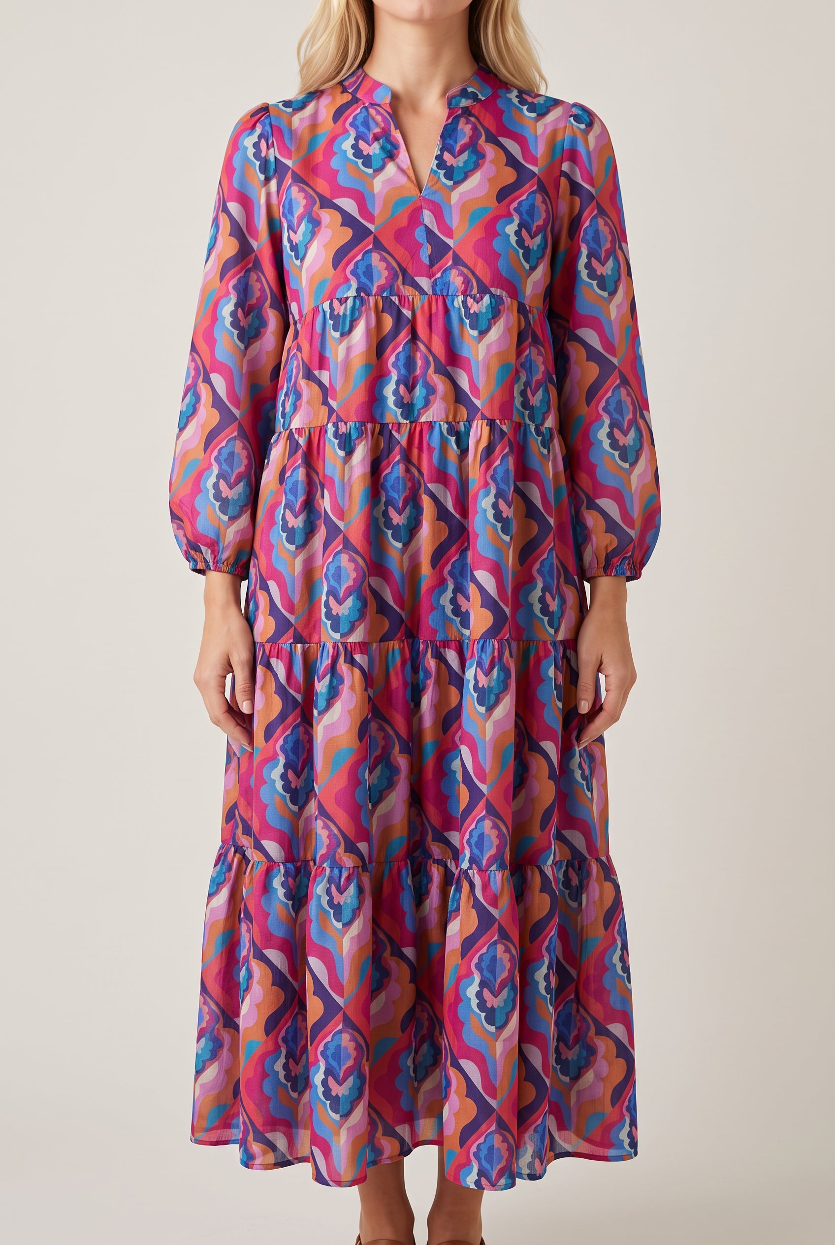 Front fit of the Calling You tiered maxi dress in Small Blue with its natural silhouette and full length.