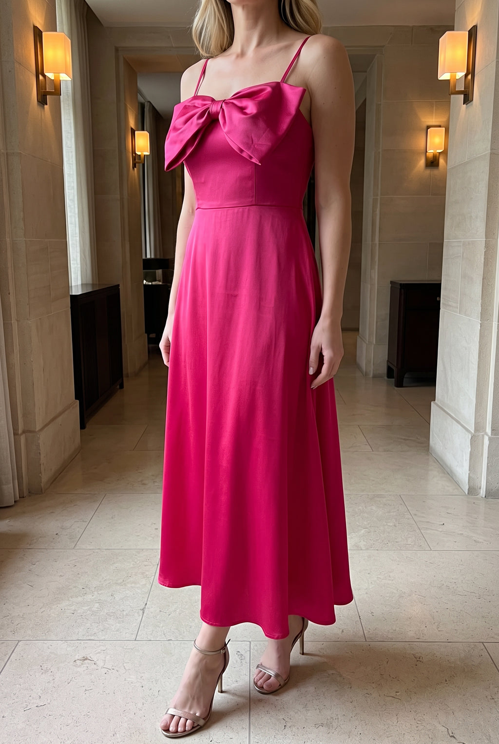 Fuchsia Bow-tiful You Midi Dress styled for a formal evening event with heels and a clutch.