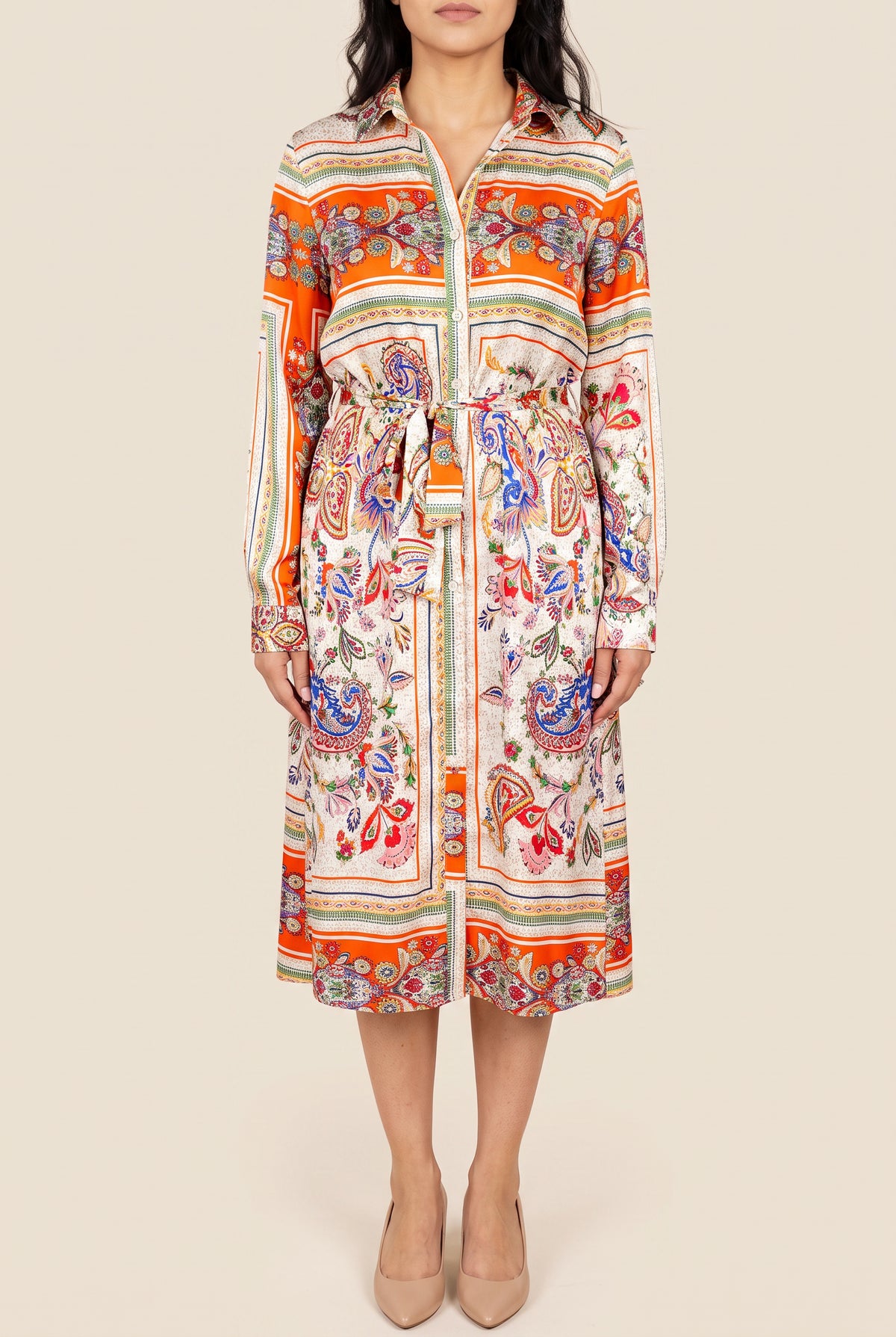 Front view of the scarf-print shirt dress in Small showing its tie waist and midi length.