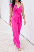 Made You Look Ruffle Shoulder Jumpsuit walking view showing wide-leg drape and full-length hem movement.