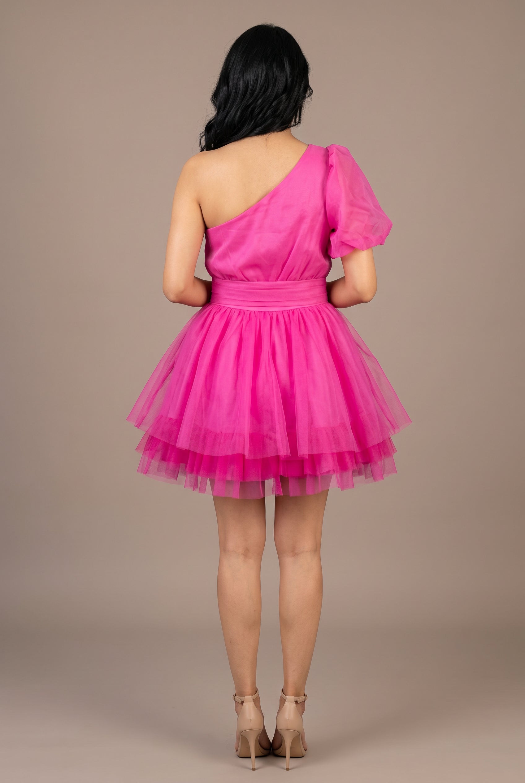 Back of the See You Again Mini Dress in Small / Pink, showing the rear neckline, waistband and layered skirt.