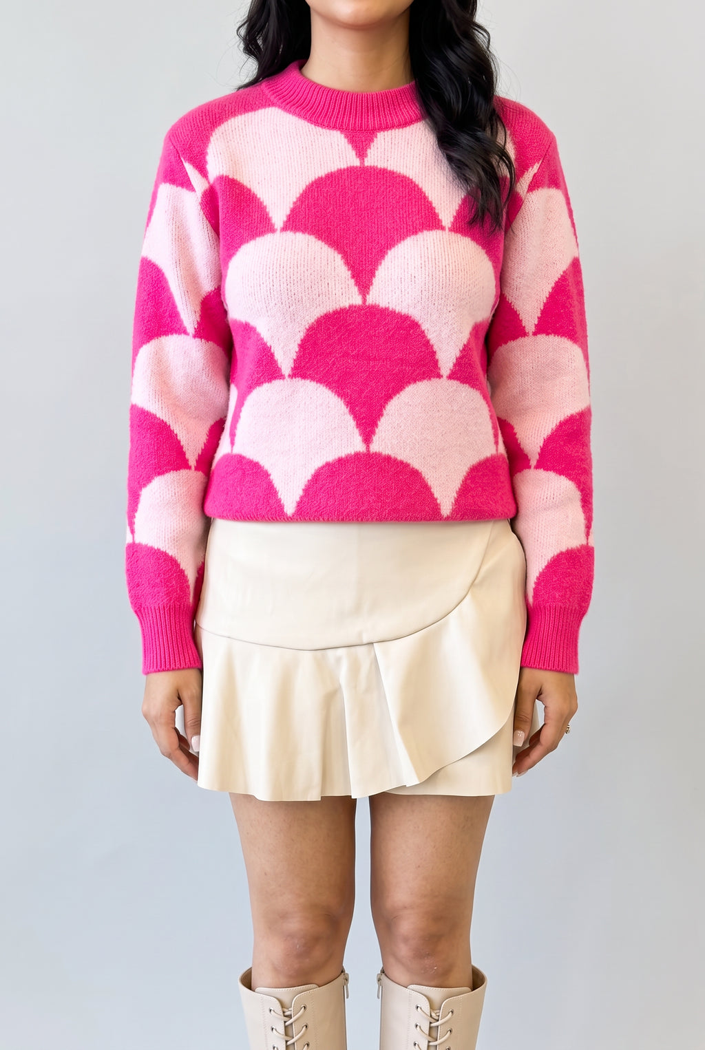Front fit of the Say Something Sweater showing its relaxed shape and untucked high-hip length.