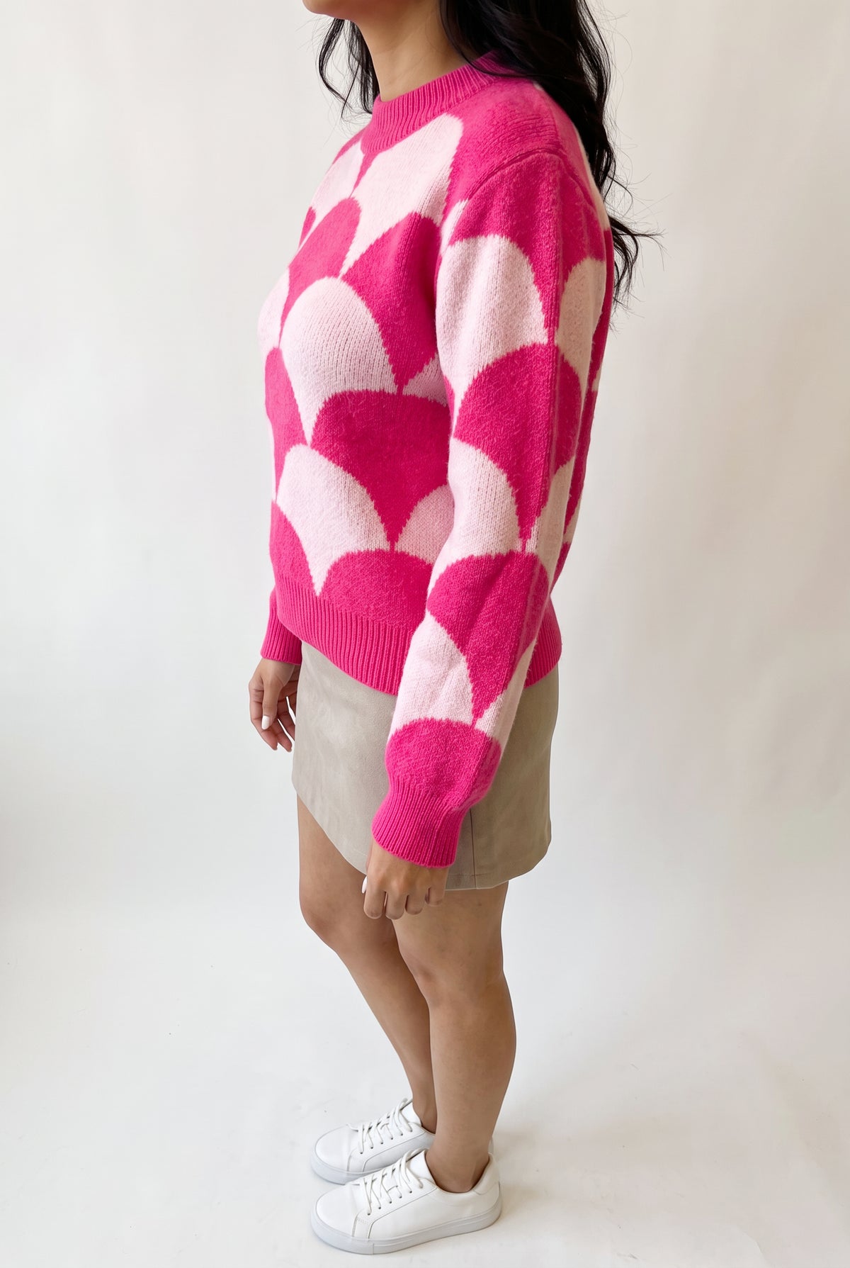 Angled side fit of the Say Something Sweater showing its dropped shoulder, sleeve volume, and body depth.