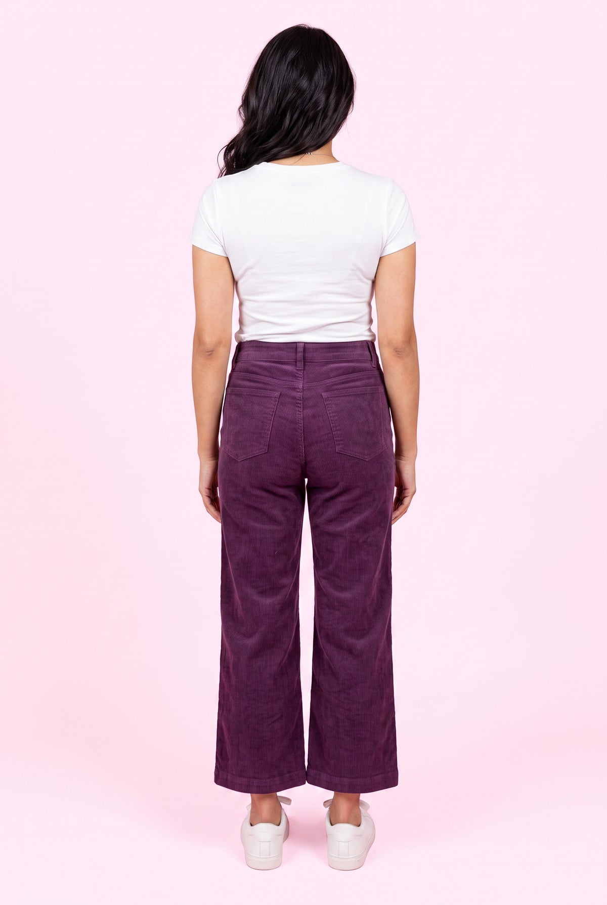 Back fit of Rollin' With You purple corduroy pants showing the waistband, seat, and cropped wide legs.