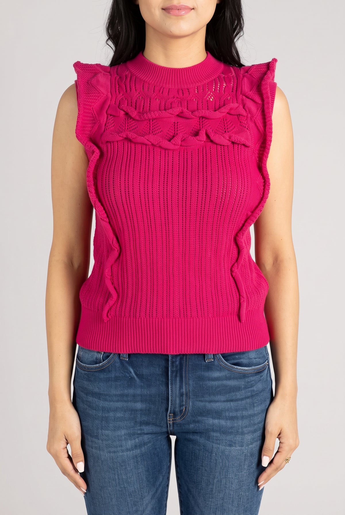 Front fit of the Love Me Again Sweater Top in hot pink showing its layered ruffles and ribbed hem.