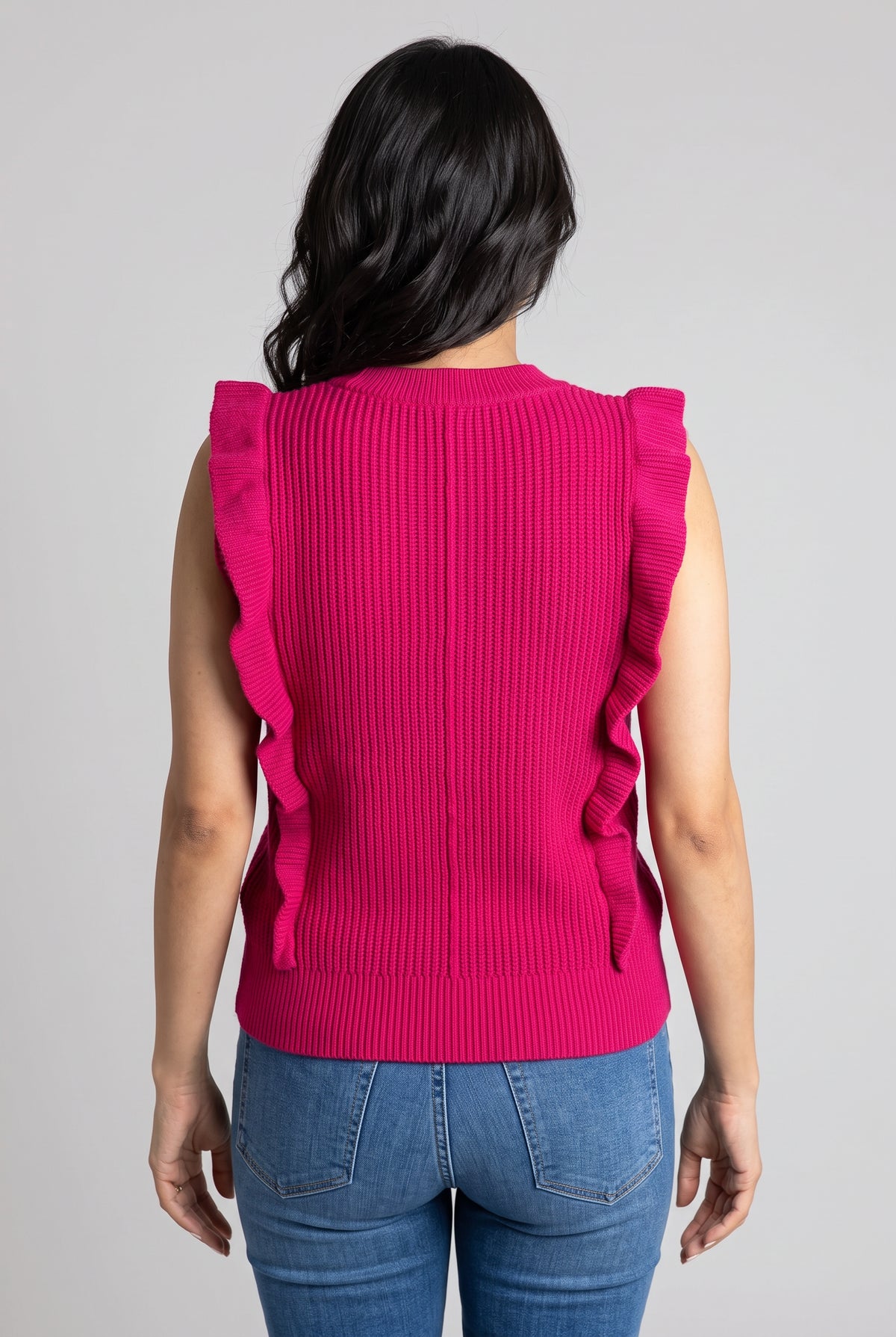Back fit of the Love Me Again Sweater Top showing the neckline, knit construction and hem length.