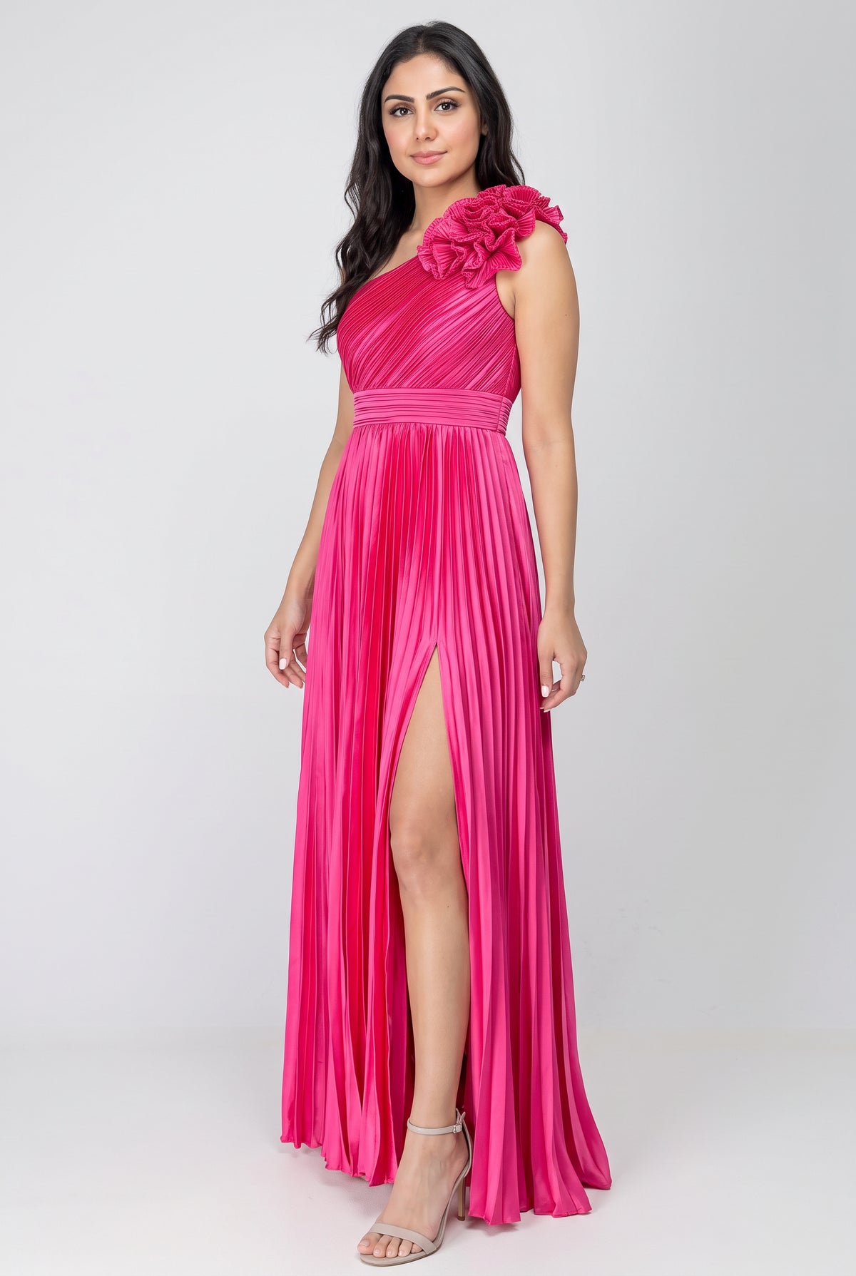 Angled side fit of the Small fuchsia One More Night maxi dress showing the slit and skirt drape.
