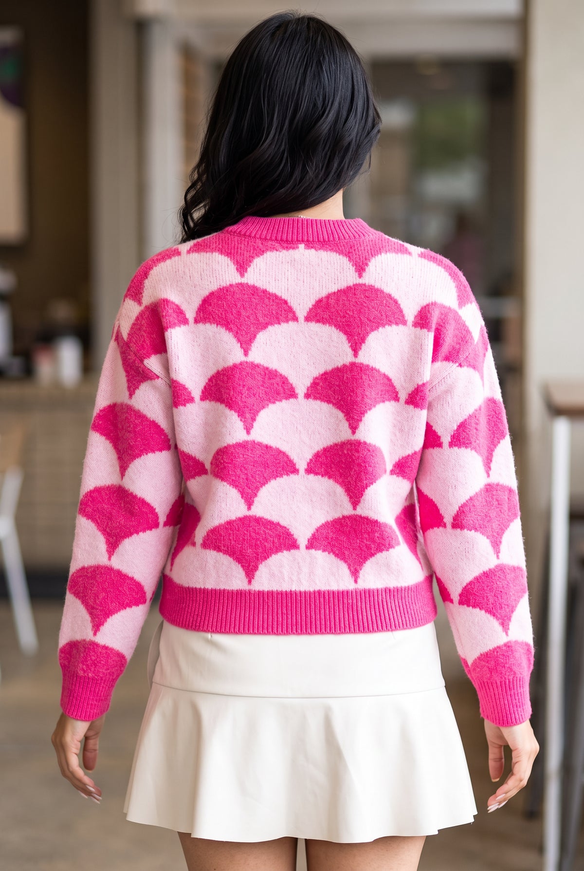 Back fit of the Say Something Sweater showing the rear pattern, neckline finish, and untucked length.