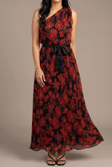 Front fit of the floral pleated one-shoulder maxi dress in Small with black sash and full hem.