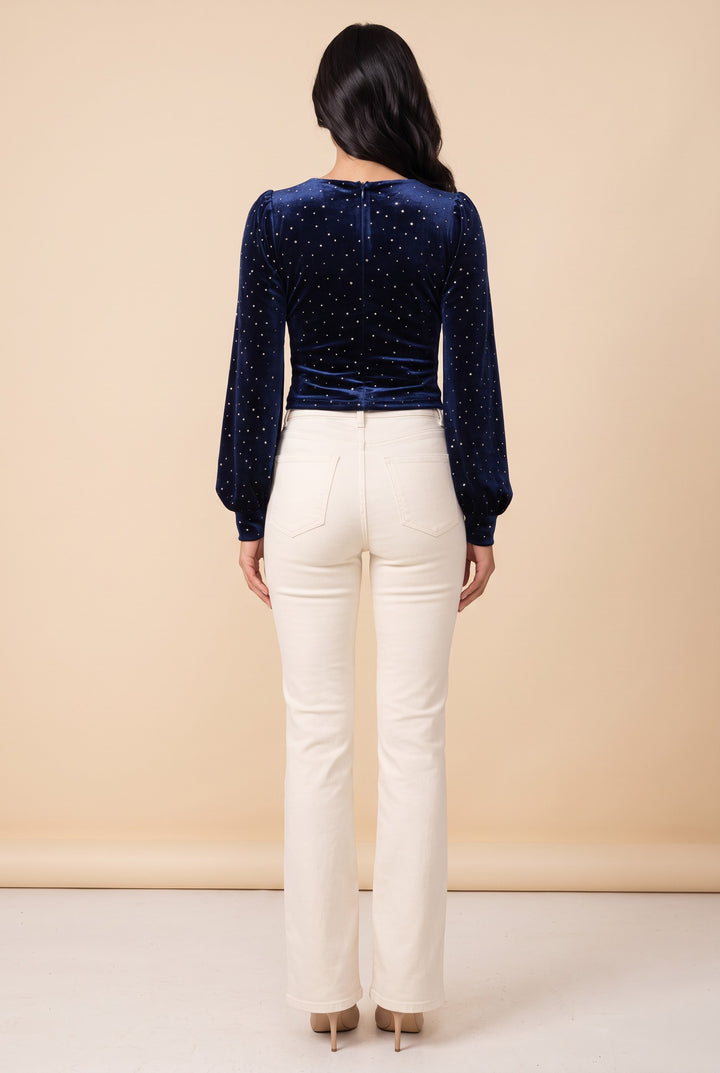 Back view of the Heart of Glass navy velvet sweetheart top worn by our model.