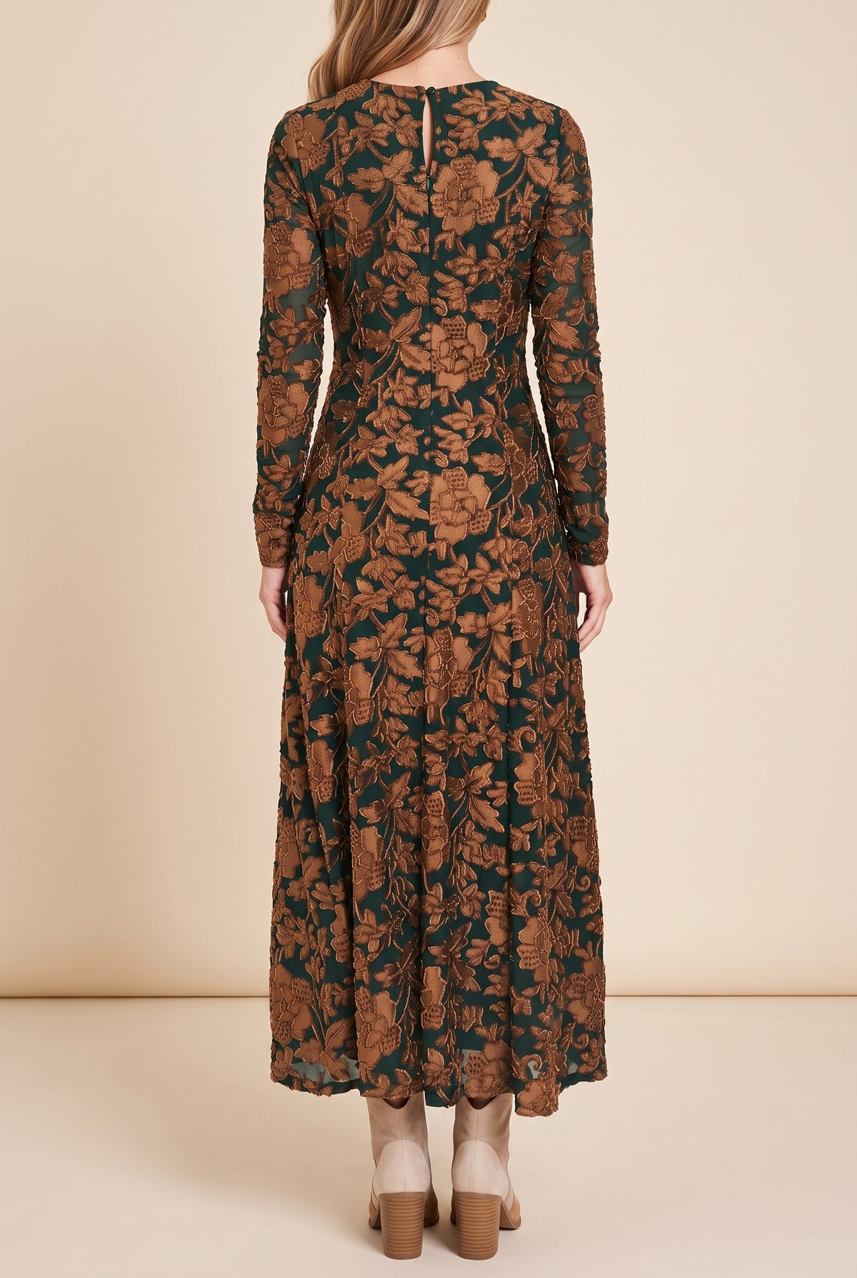 Back view of the green velvet burnout floral maxi dress.