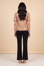 Back view of the latte split neck faux leather top.