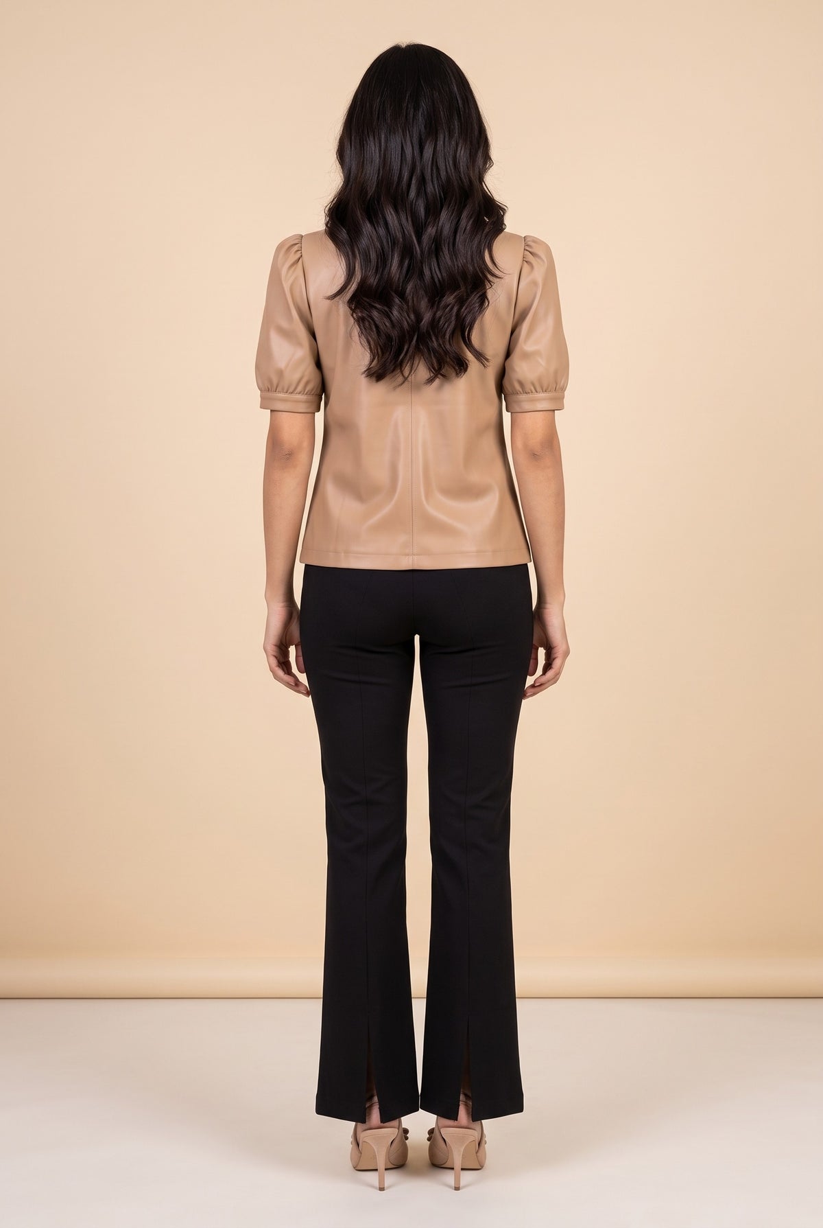 Back view of the latte split neck faux leather top.