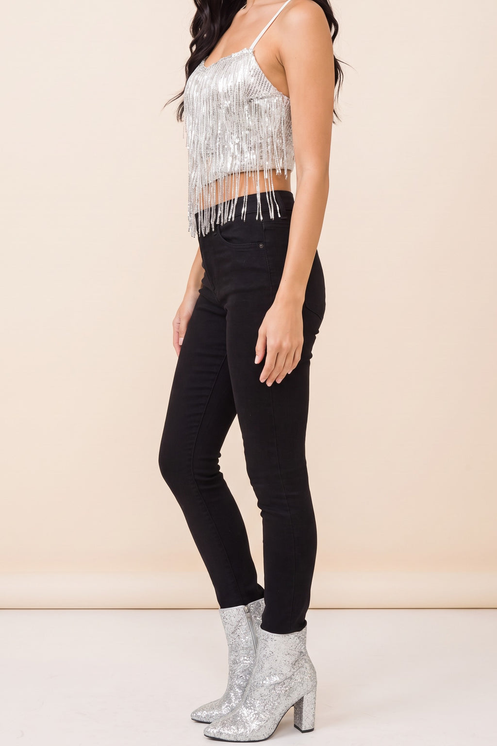Side view of the Dancing in the Moonlight sequin fringe cami worn by our model.