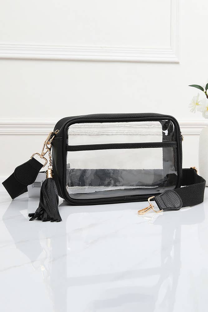 Joanna Cross Body Camera Bag in Black: clear body with black trim, black tassel and wide black strap