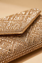 Close view of the Gemma rhinestone envelope clutch showing the material and details.