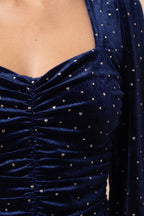 Close view of the Heart of Glass navy velvet sweetheart top showing the material and details.