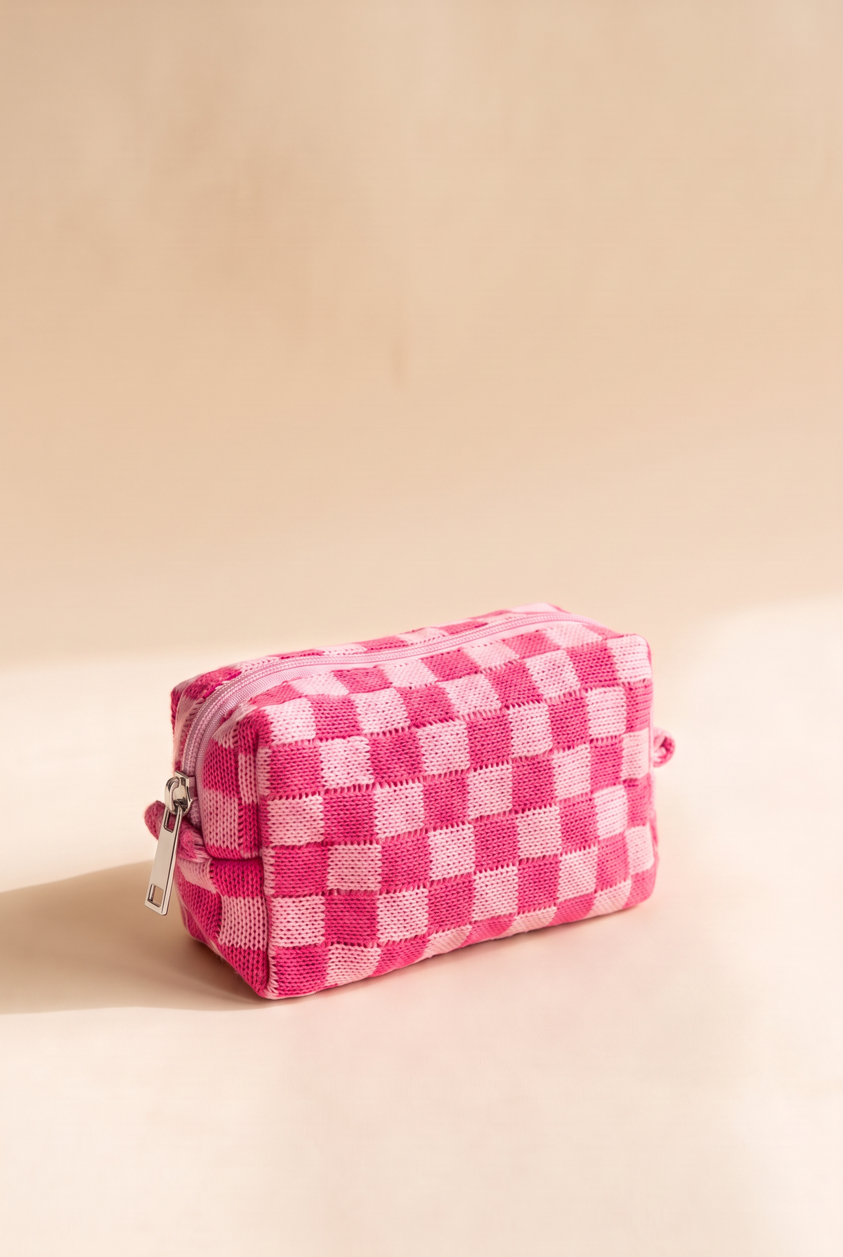Check Yourself Cosmetic Bag in Pink, boxy knit pouch in hot pink and light pink checks with a pink zip and silver metal pull