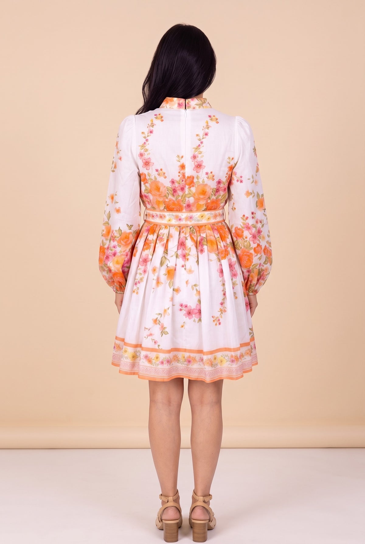 Back view of the Sweet Sunshine mock neck floral border mini dress.