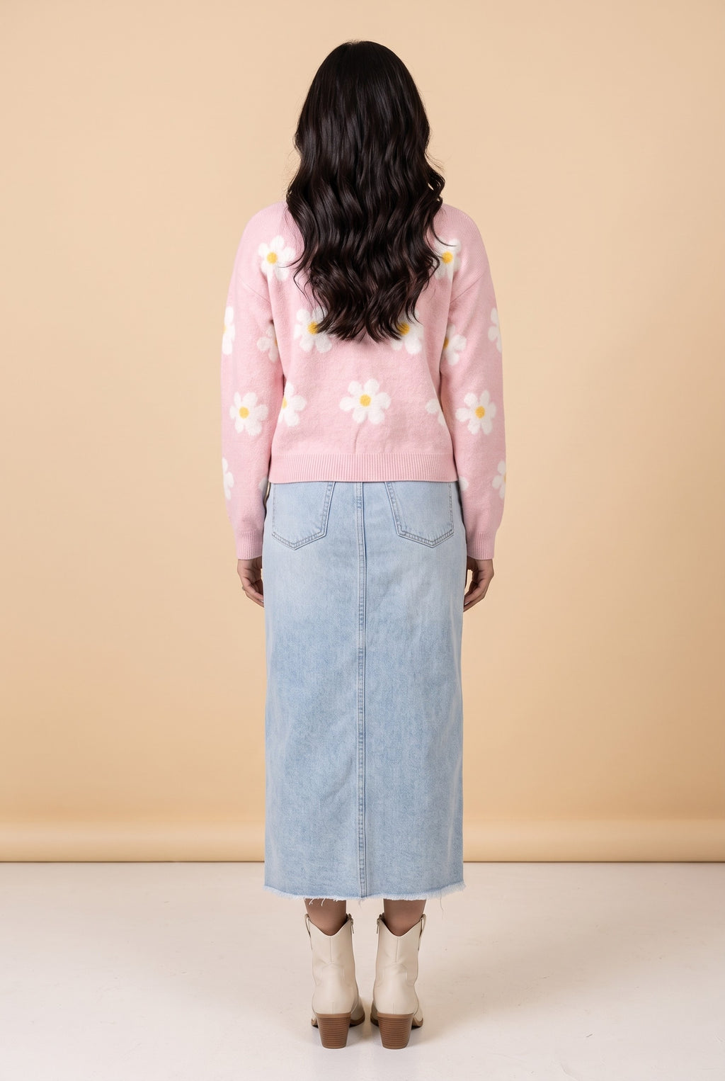 Back view of the Let's Just Stay pink daisy floral sweater.
