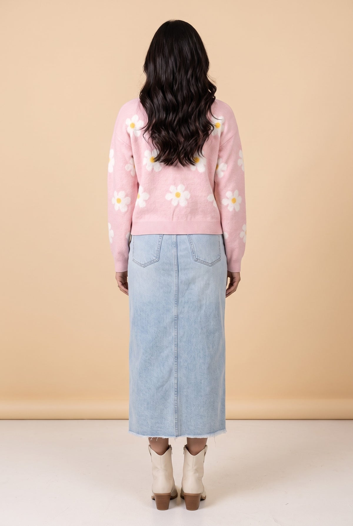Back view of the Let's Just Stay pink daisy floral sweater.