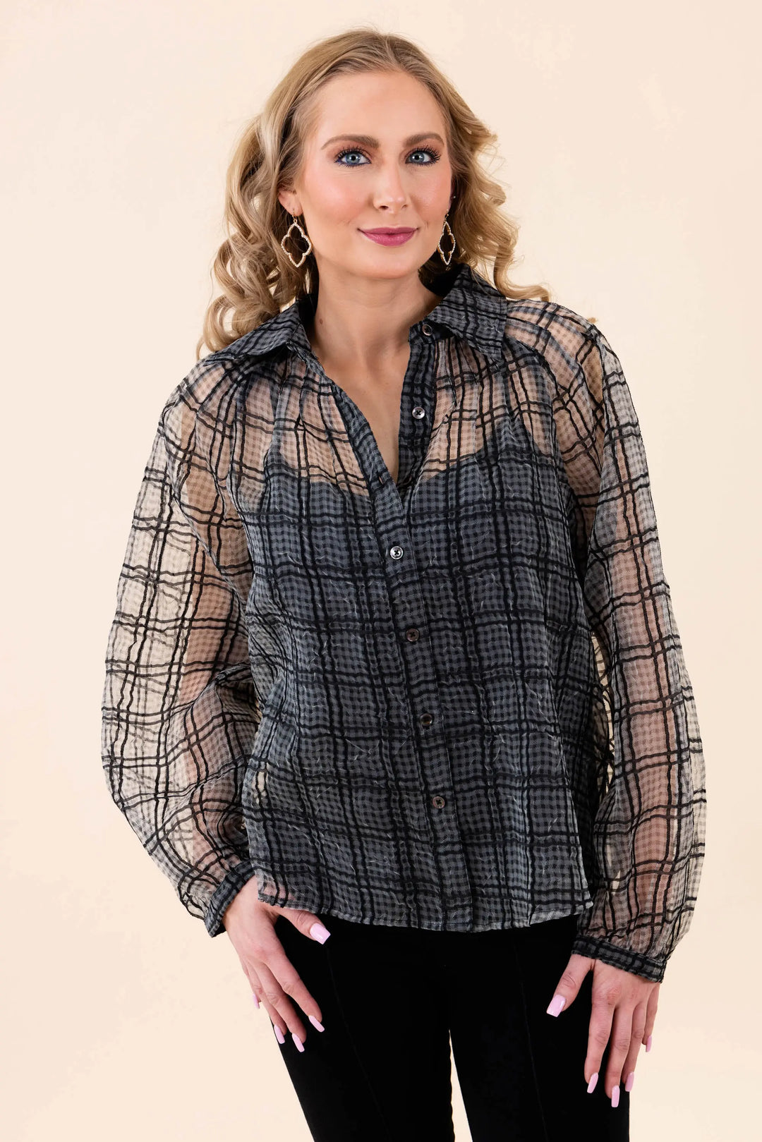 A stylish sheer plaid button-up blouse with long sleeves, featuring a lightweight and breathable design. Perfect for casual and workwear styling.