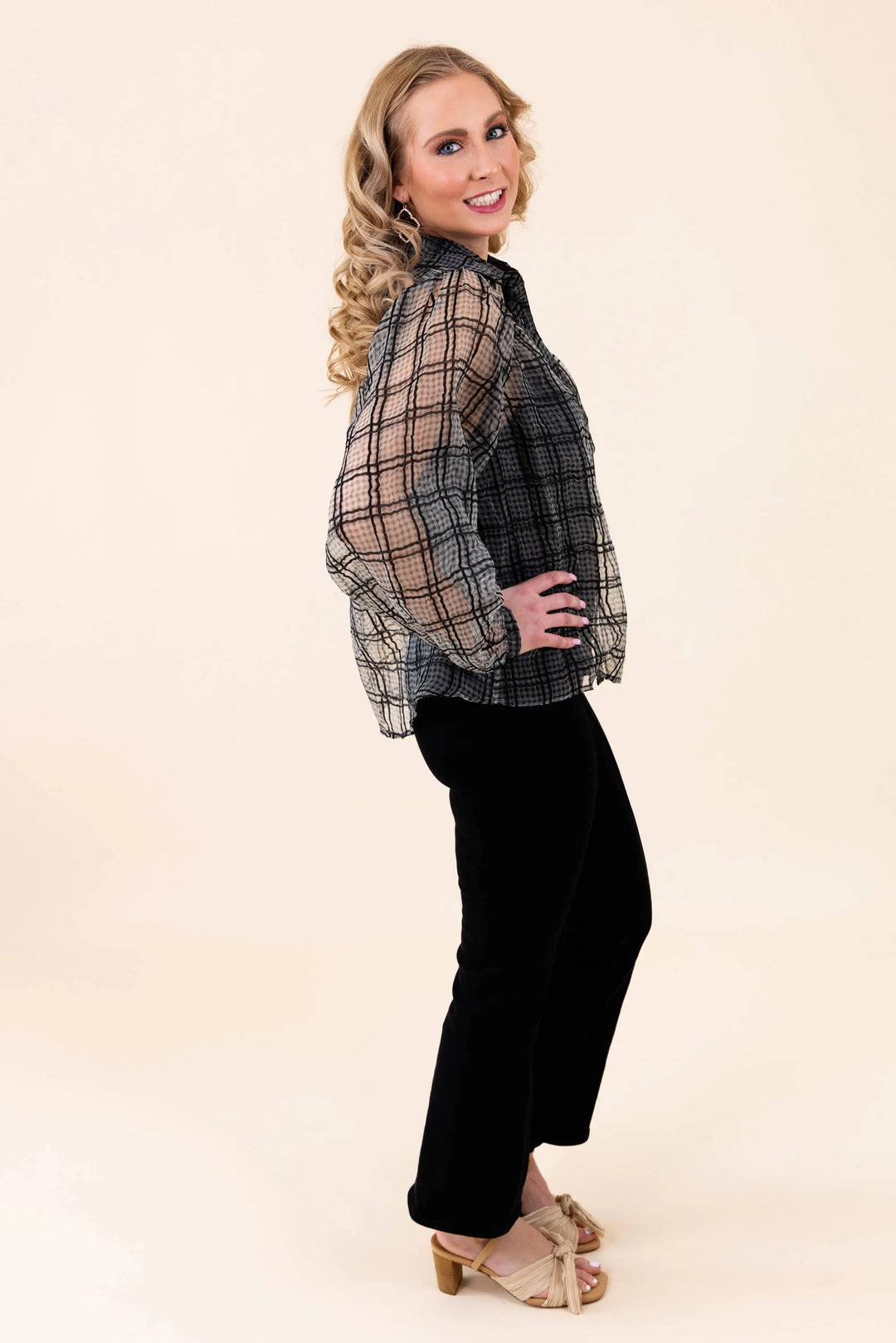 A stylish sheer plaid button-up blouse with long sleeves, featuring a lightweight and breathable design. Perfect for casual and workwear styling.