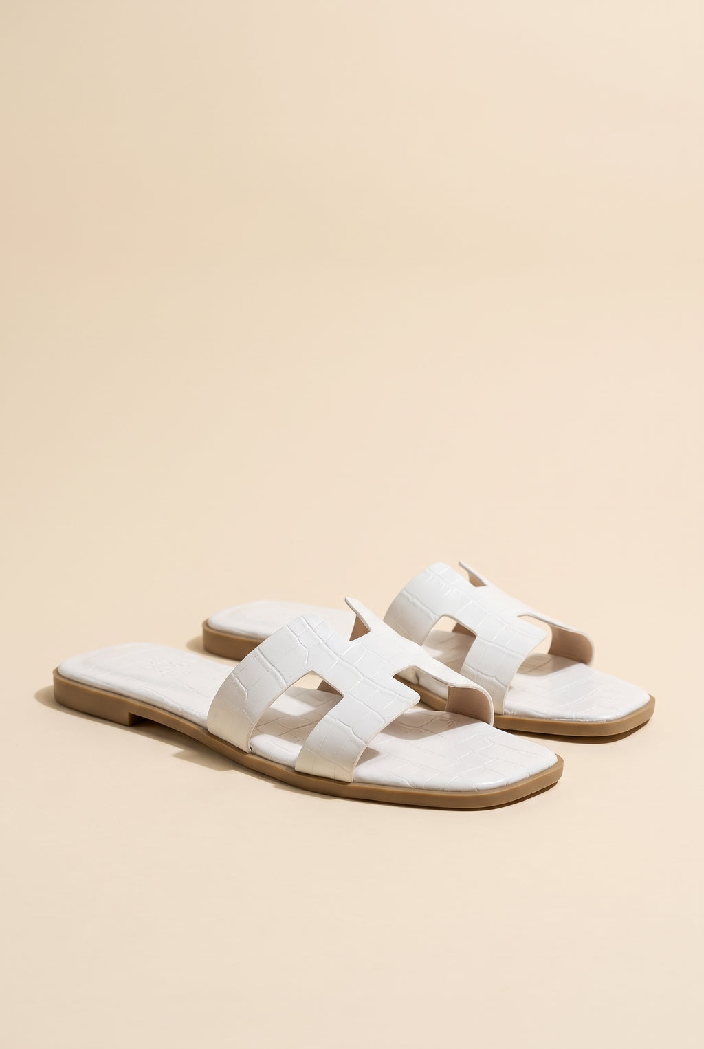 Amara H-Shaped Cutout Croc Slide Sandal, Still life