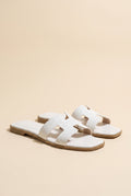 Amara H-Shaped Cutout Croc Slide Sandal, Still life
