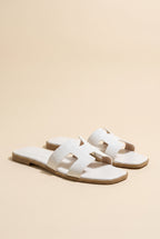 Amara H-Shaped Cutout Croc Slide Sandal, Still life