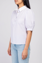 Angled side fit of the Give It A Go striped top, showing the rounded puff sleeve, cuff and snap placket.