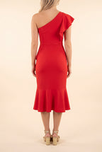 Back view of the Scarlet Sway red one-shoulder ruffle midi dress, showing the single ruffled strap, the plain back and the trumpet hem.