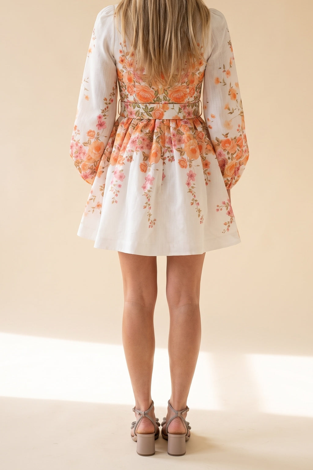 Walking On Sunshine Mock Neck Mini Dress, back view showing the matching belt and full pleated skirt