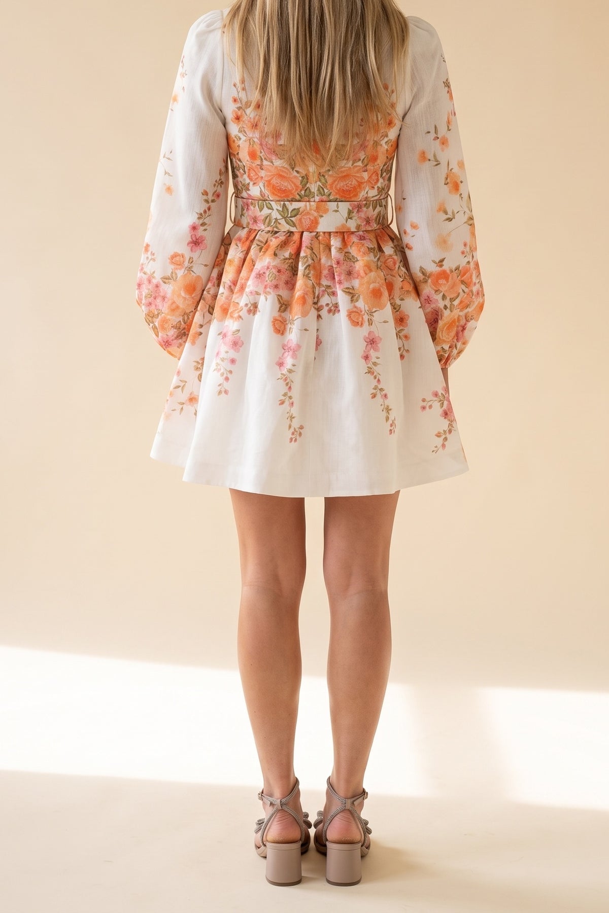 Walking On Sunshine Mock Neck Mini Dress, back view showing the matching belt and full pleated skirt