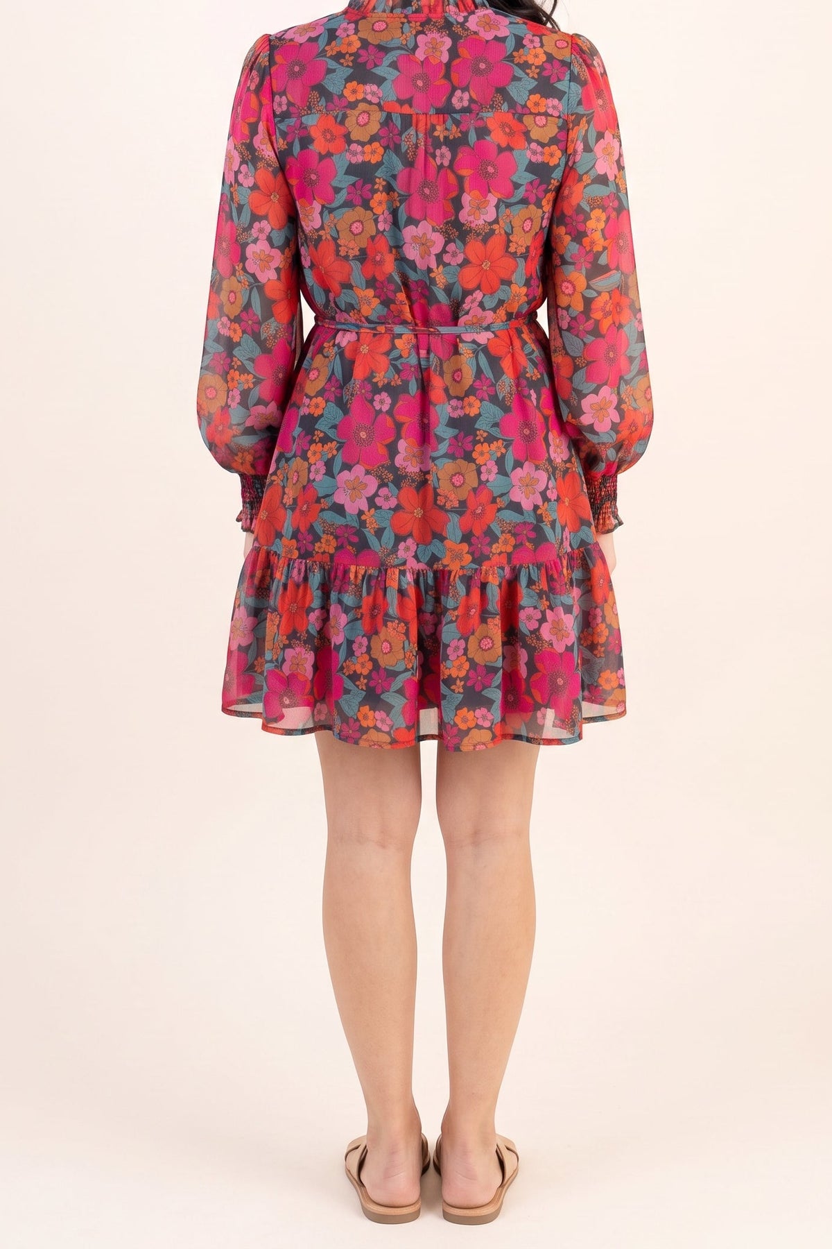Only If You Knew Floral Dress, back view with the tie waist and ruffle hem