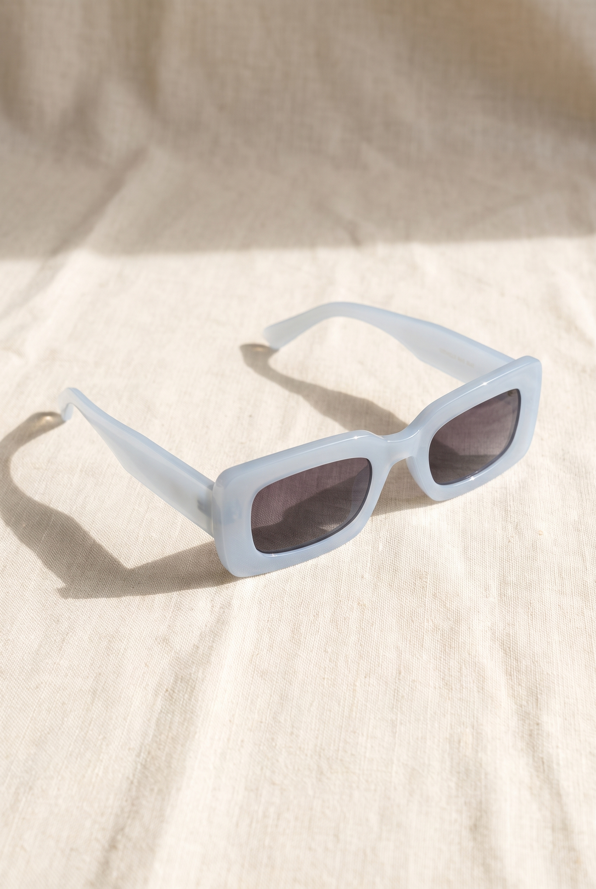 Carla Sunglasses, Blue still life