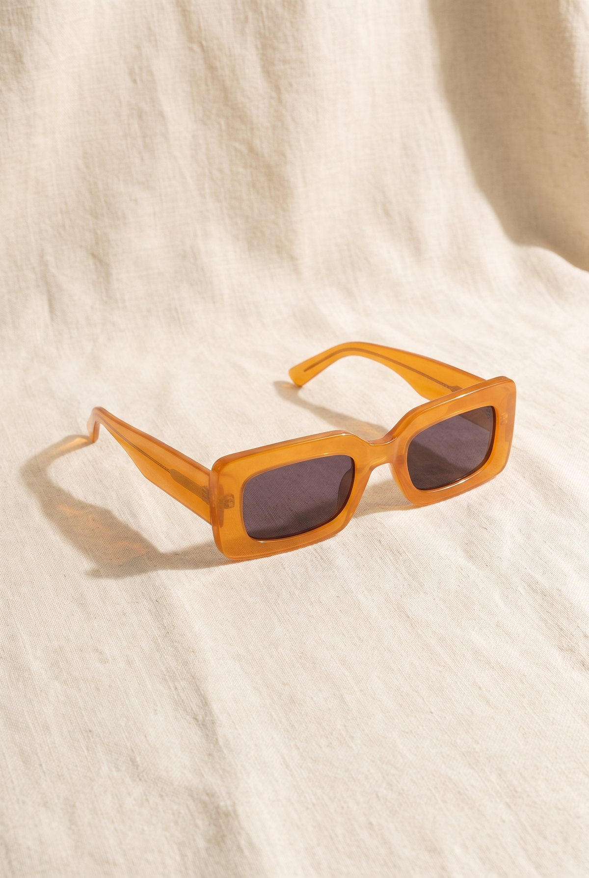 Carla Sunglasses, Orange still life