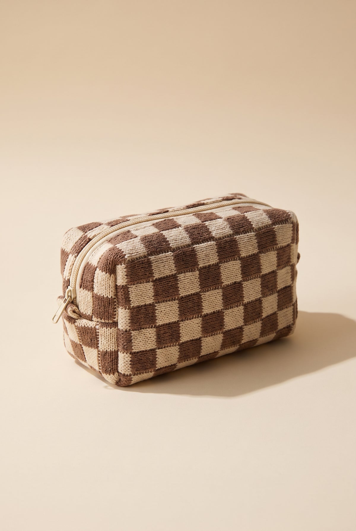 Check Yourself Cosmetic Bag in Brown, boxy knit pouch in brown and cream checks with a cream zip and silver metal pull