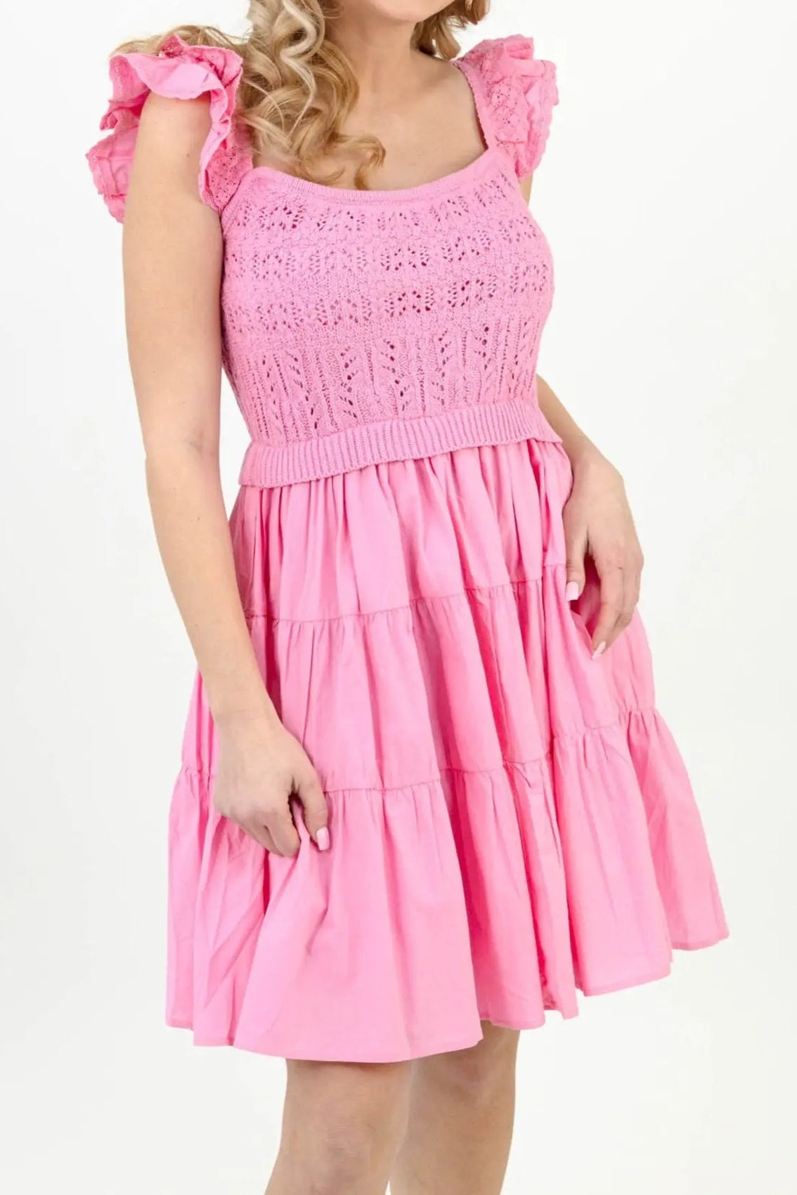 Front of the Completely In Tune light pink dress, showing the pointelle crochet knit bodice, ruffled straps, square neckline and tiered cotton skirt