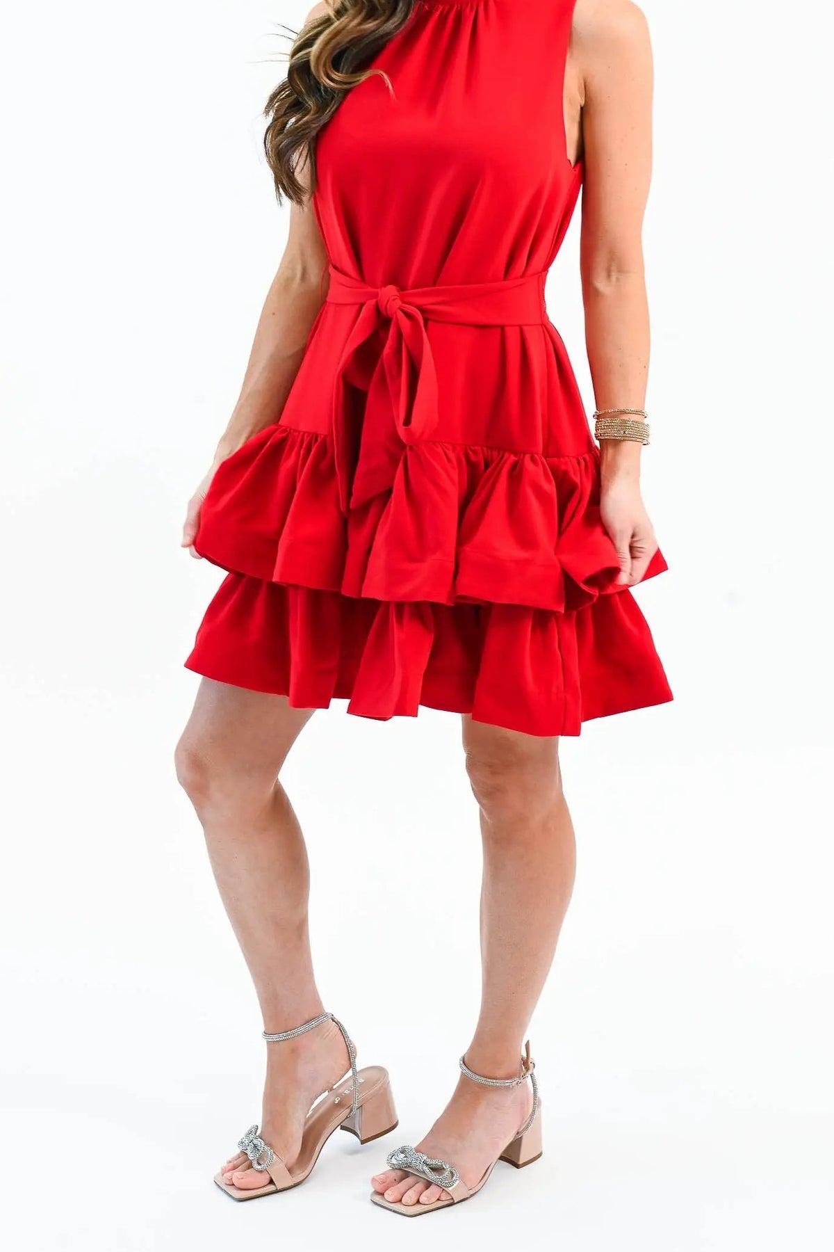 Front of the Let's Stay Together red sleeveless mini dress, showing the mock neck, self-tie waist sash and two ruffled tiers at mid-thigh