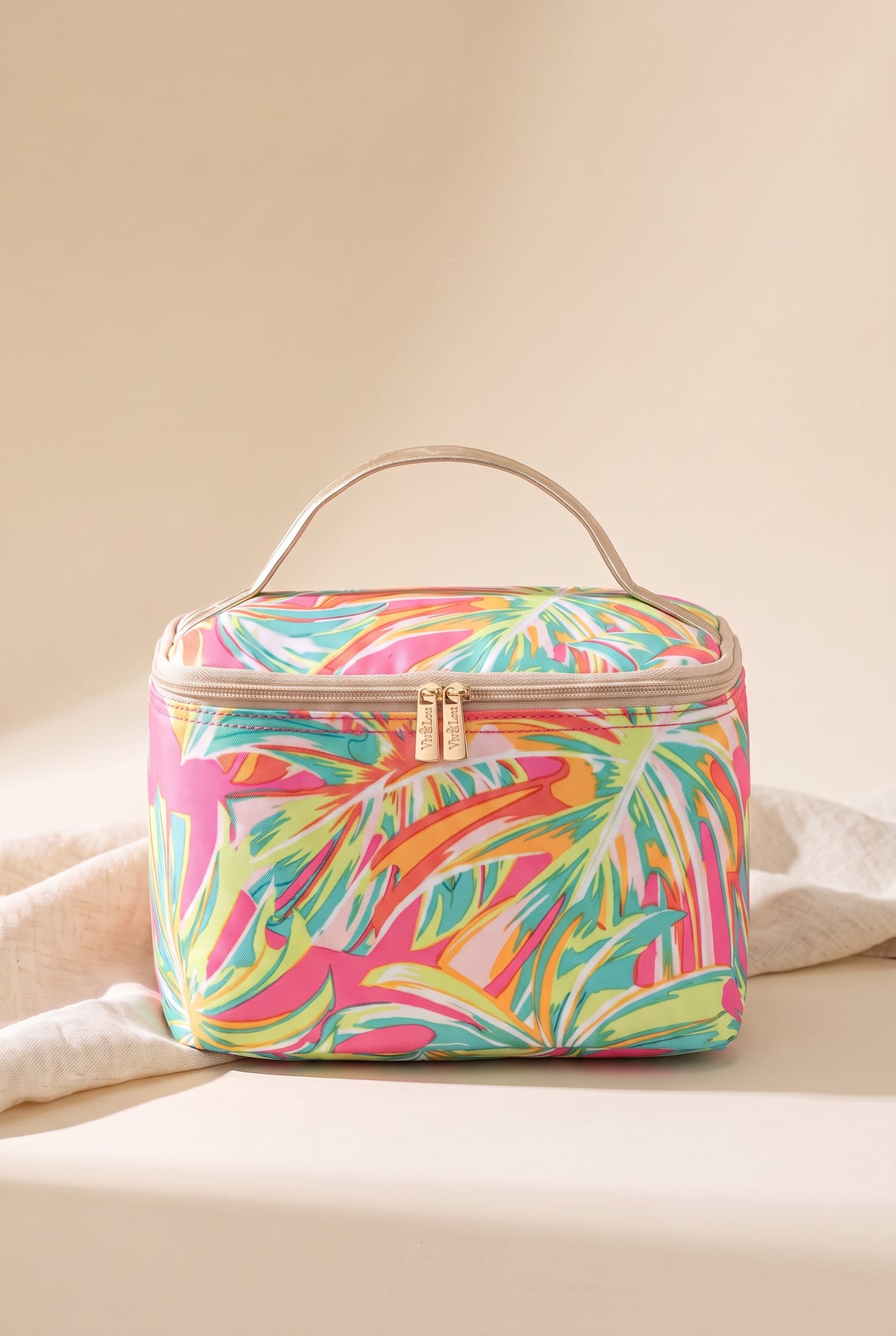 Diana Tropical Cosmetic Bag, boxy train case in a pink, coral, lime and mint palm print with a tan zip, Viv&Lou gold zip pulls and a metallic gold top handle