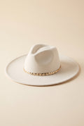 Hadley ivory felt fedora with a braided gold chain band, packshot on cream