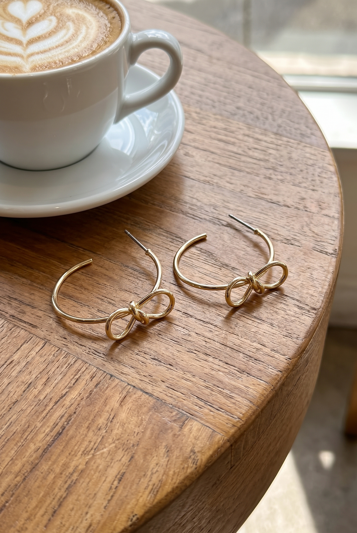 Harley Bow Tie Hoop Earrings, Worn